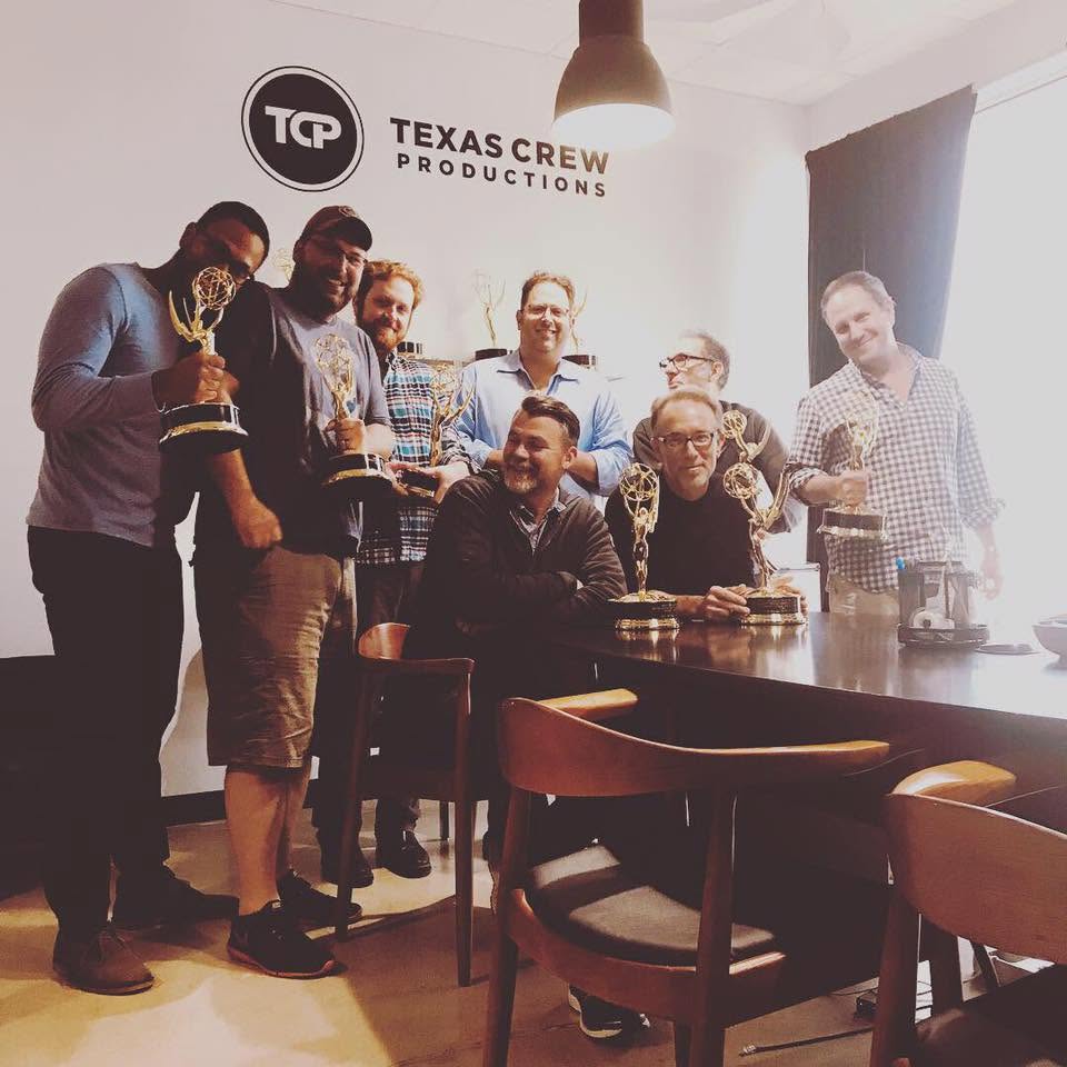 The Texas Crew Productions team holding their Emmy Awards